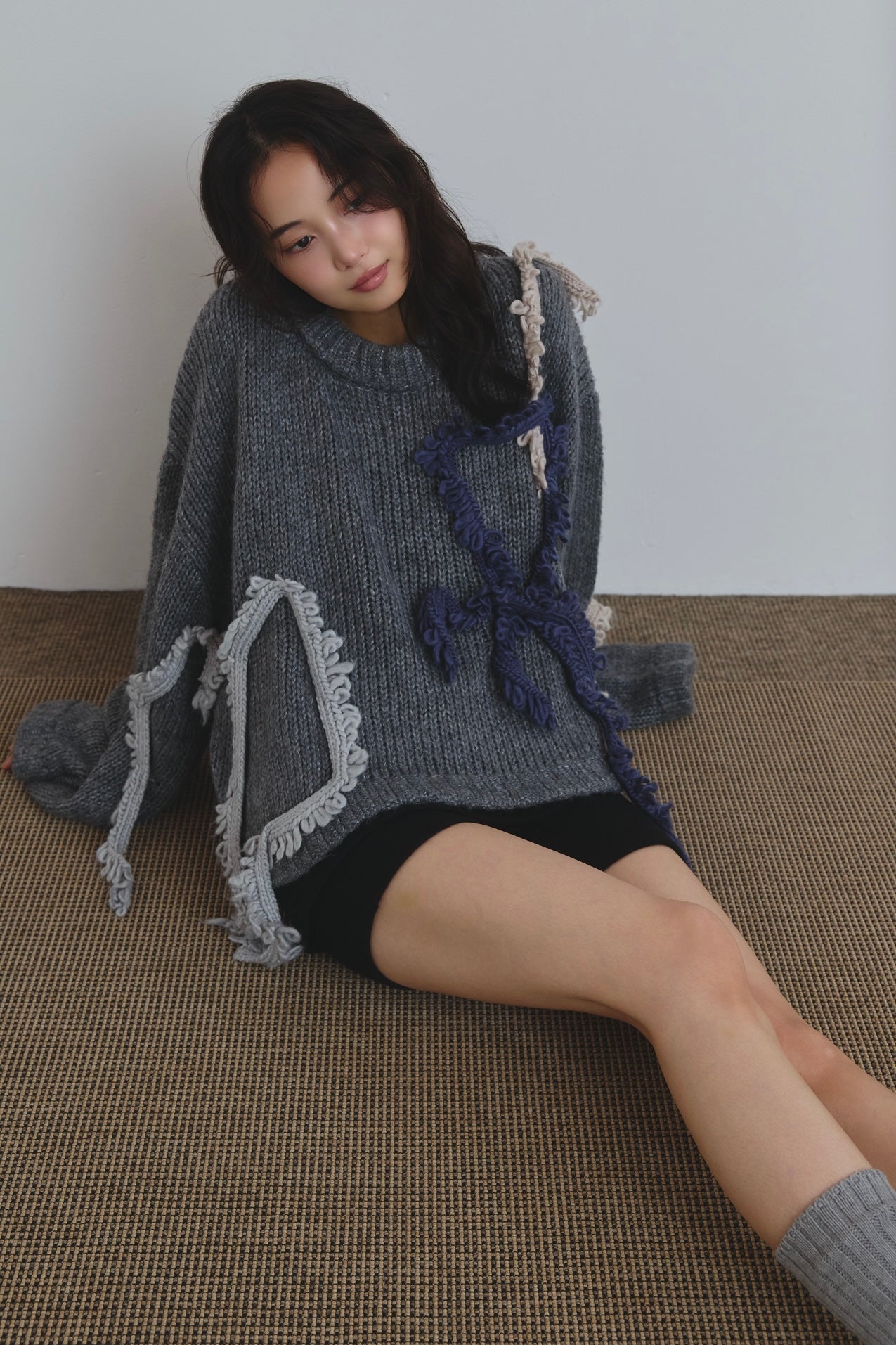asymmetry fringe knit