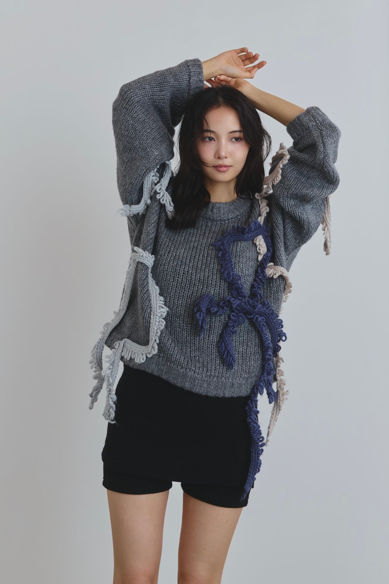 asymmetry fringe knit
