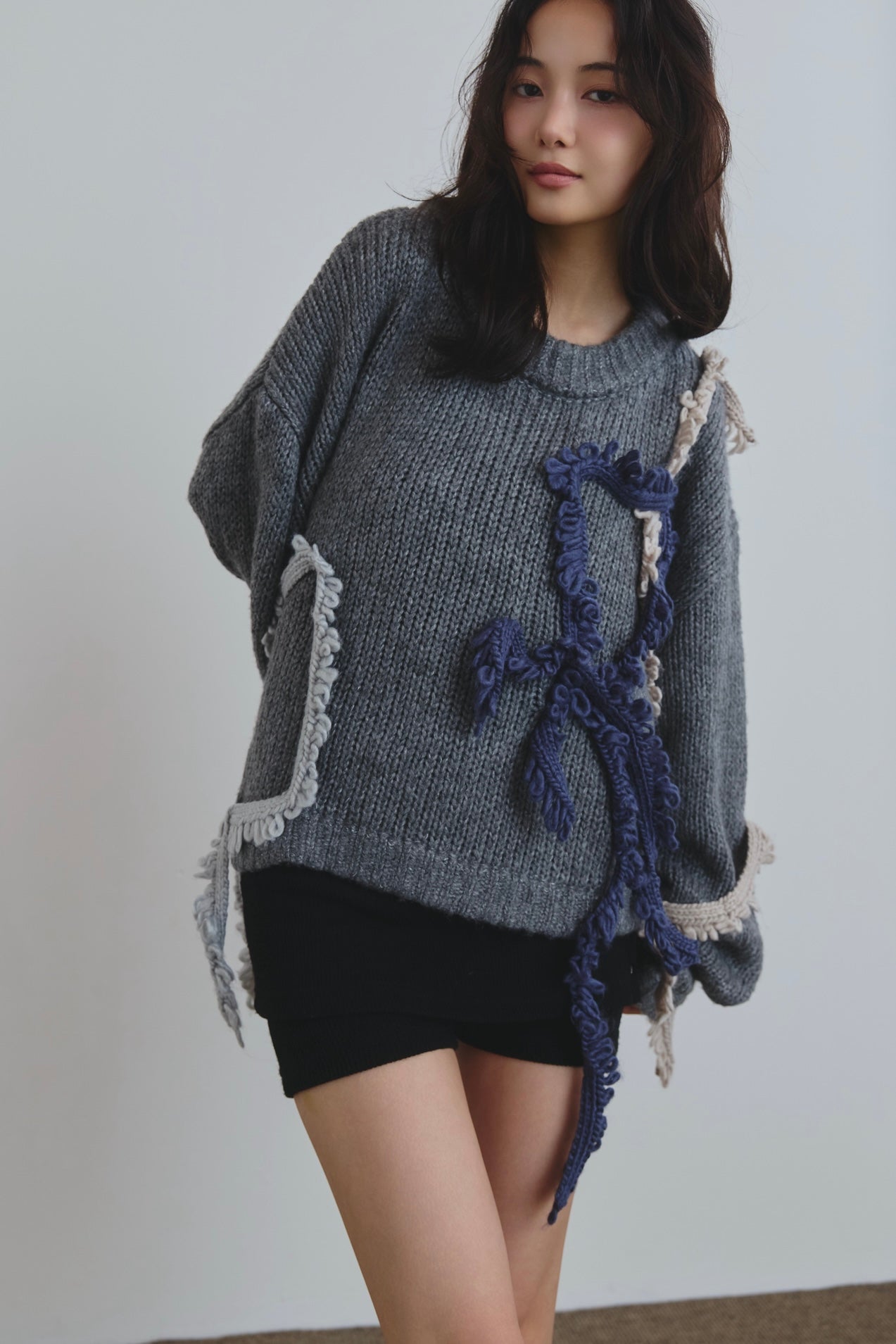 asymmetry fringe knit