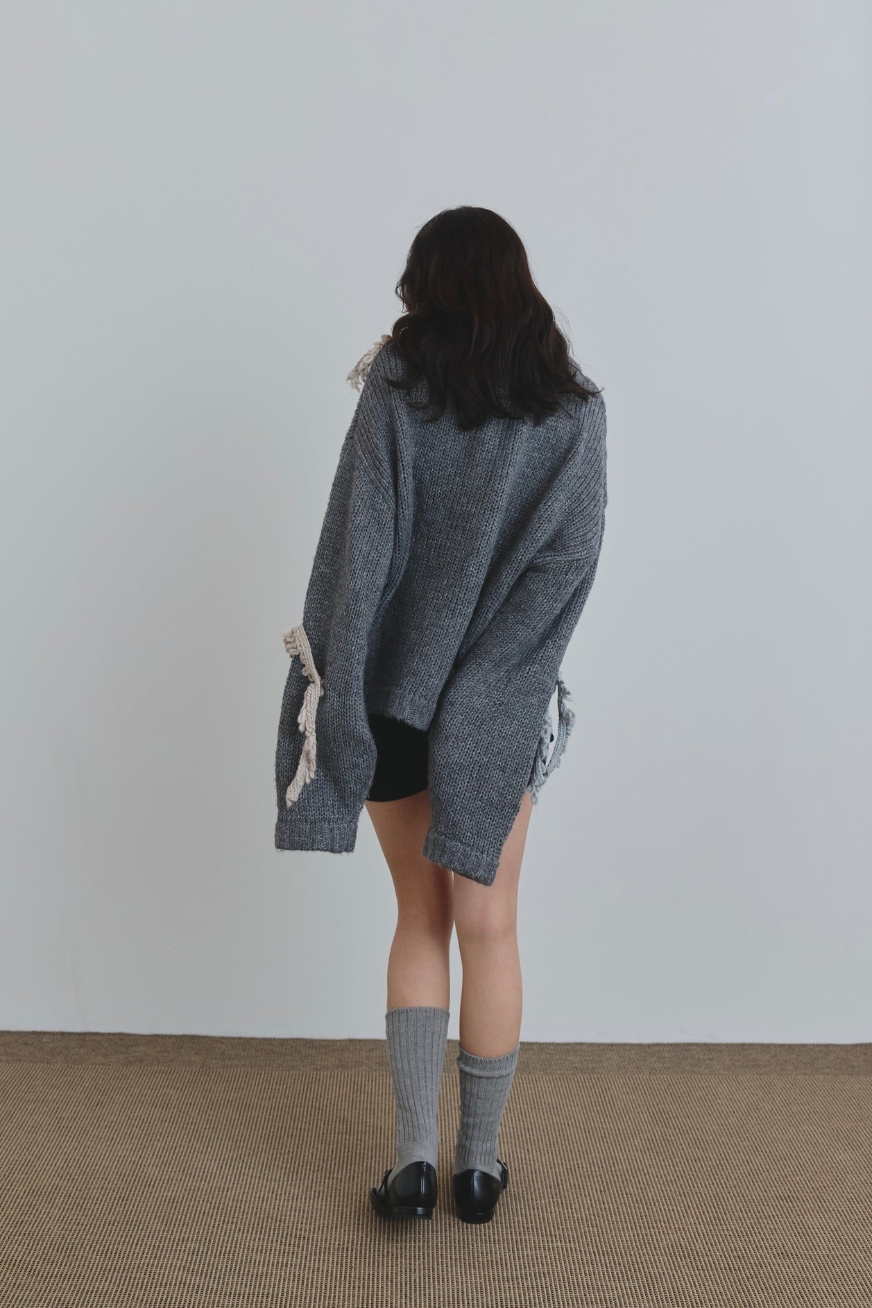 asymmetry fringe knit