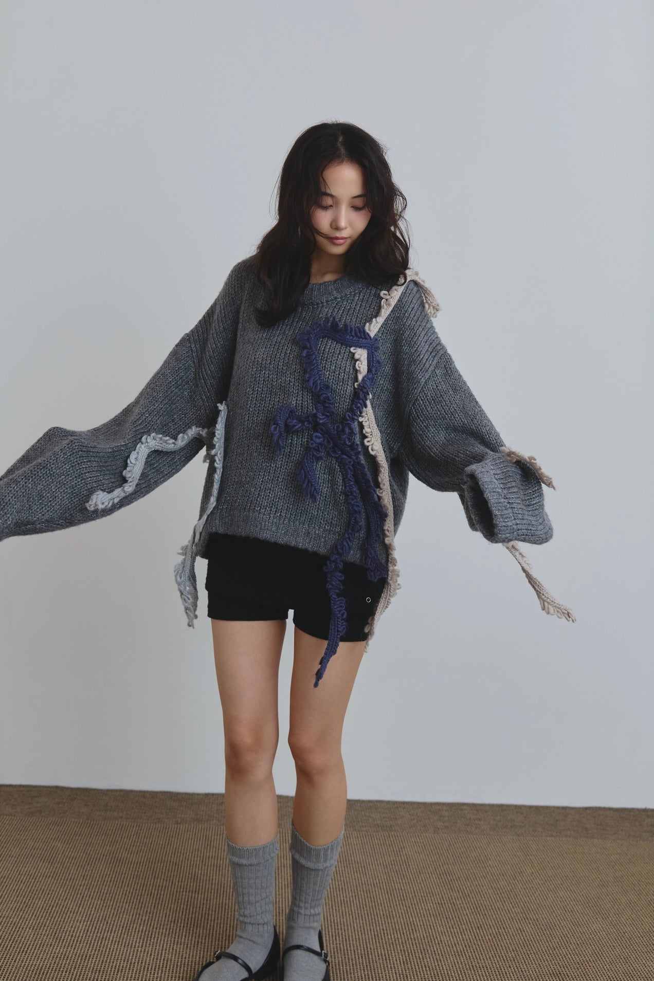 asymmetry fringe knit