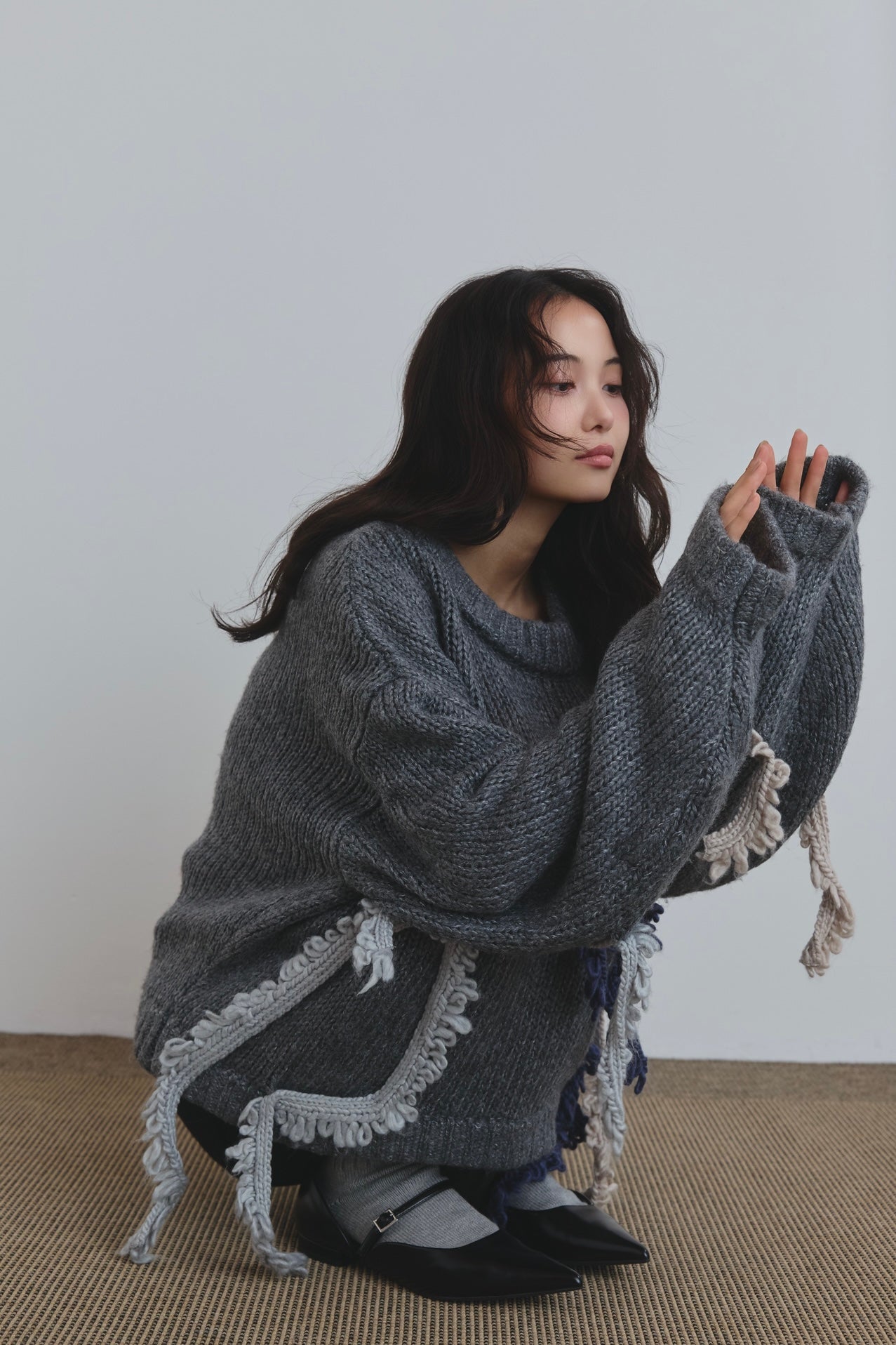 asymmetry fringe knit