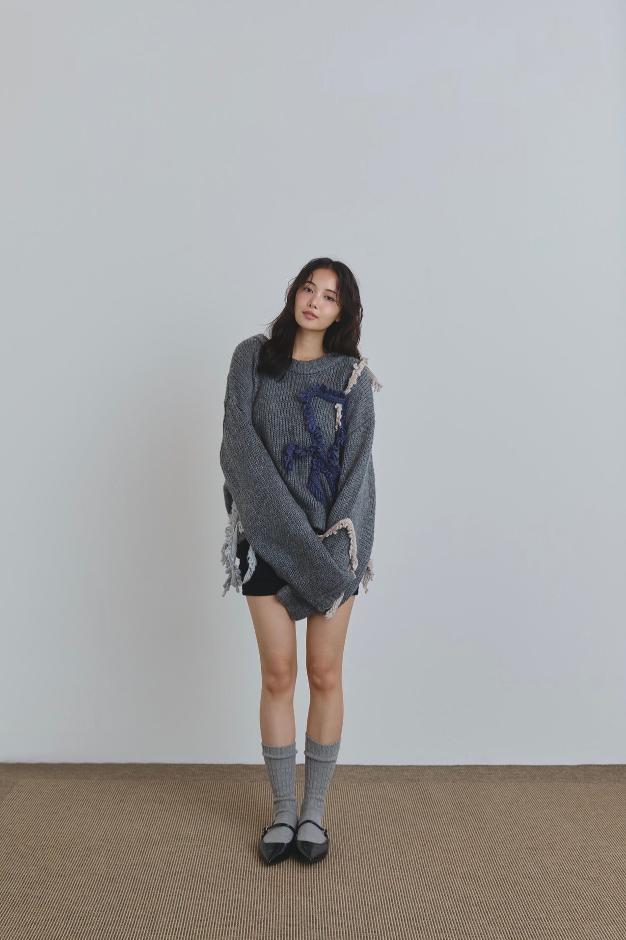 asymmetry fringe knit