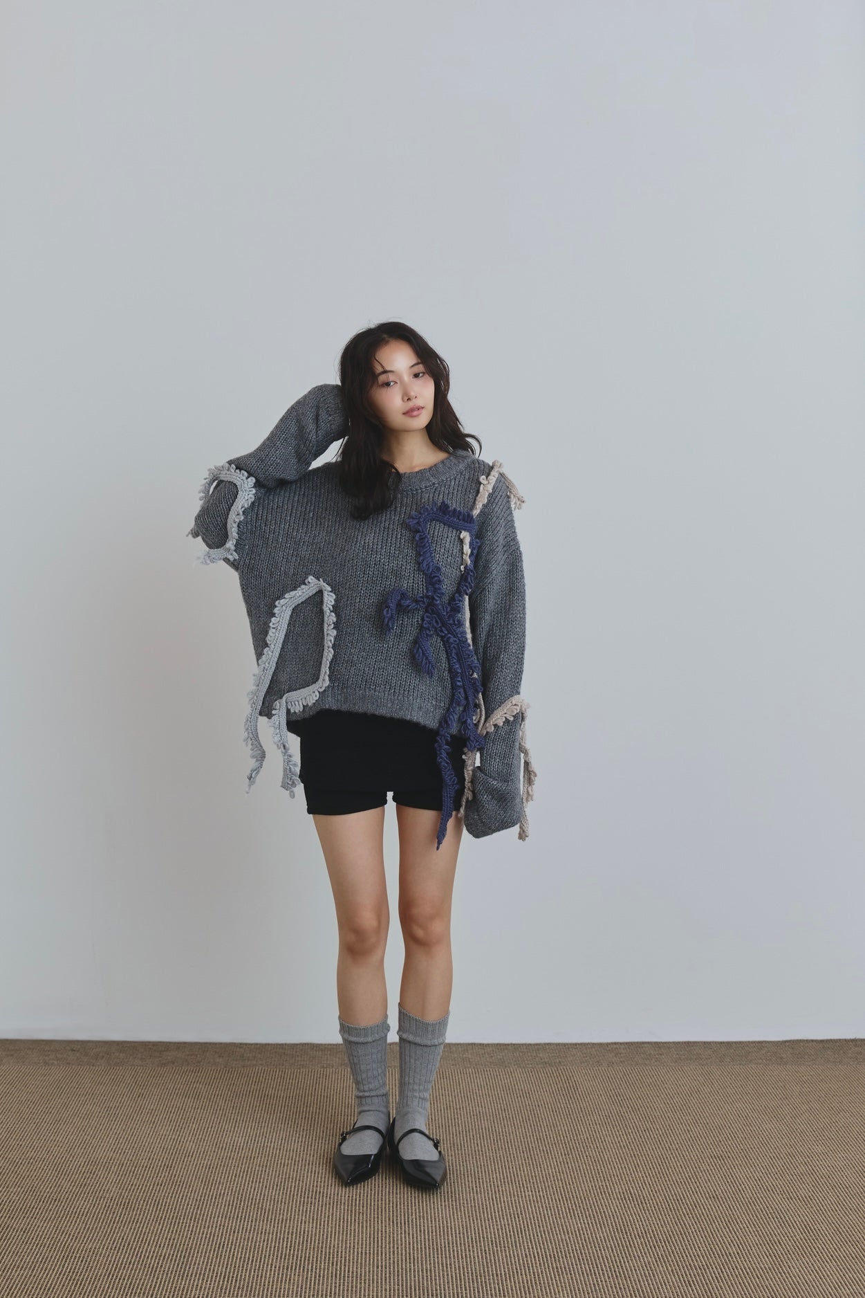 asymmetry fringe knit