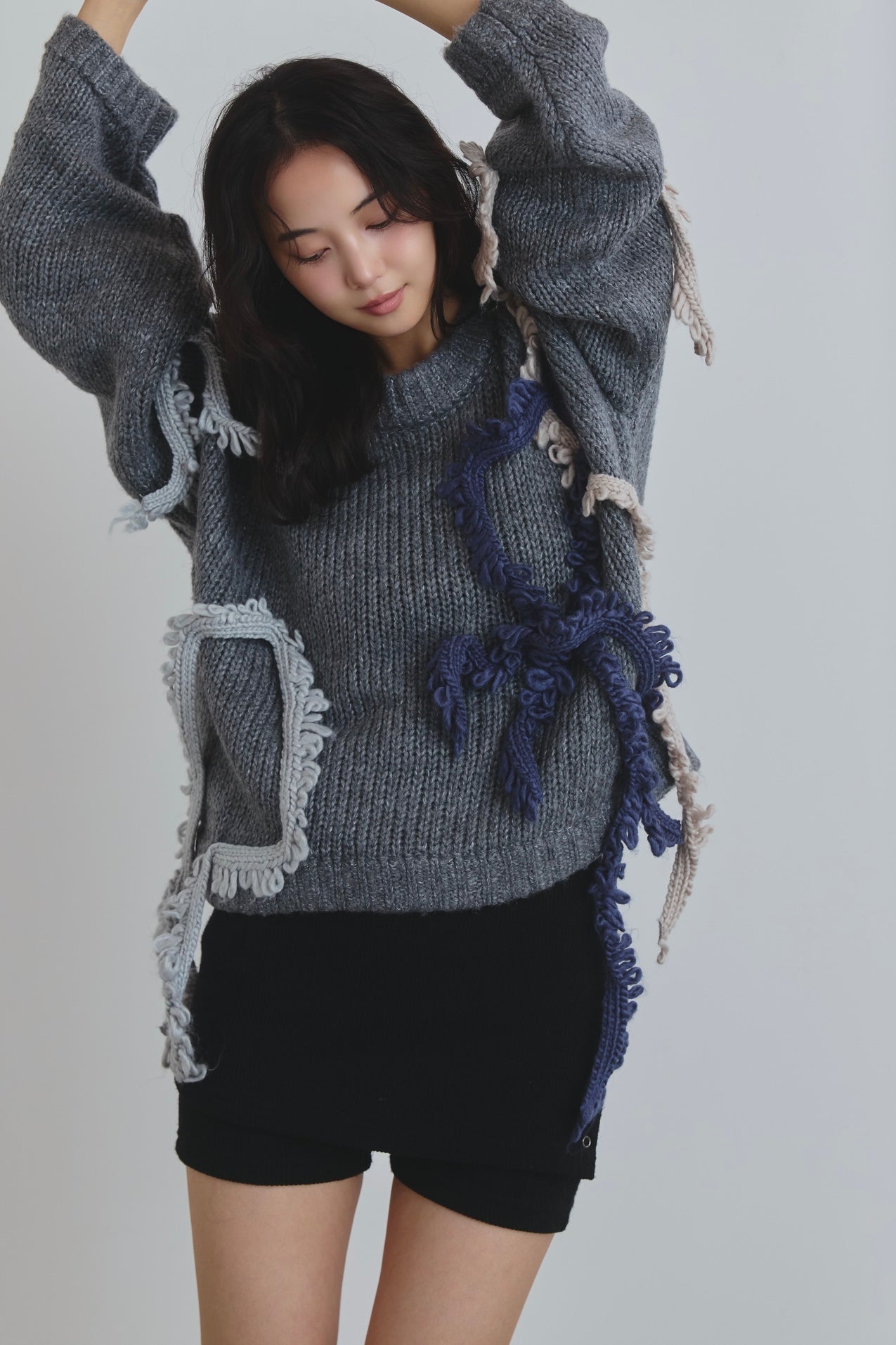 asymmetry fringe knit