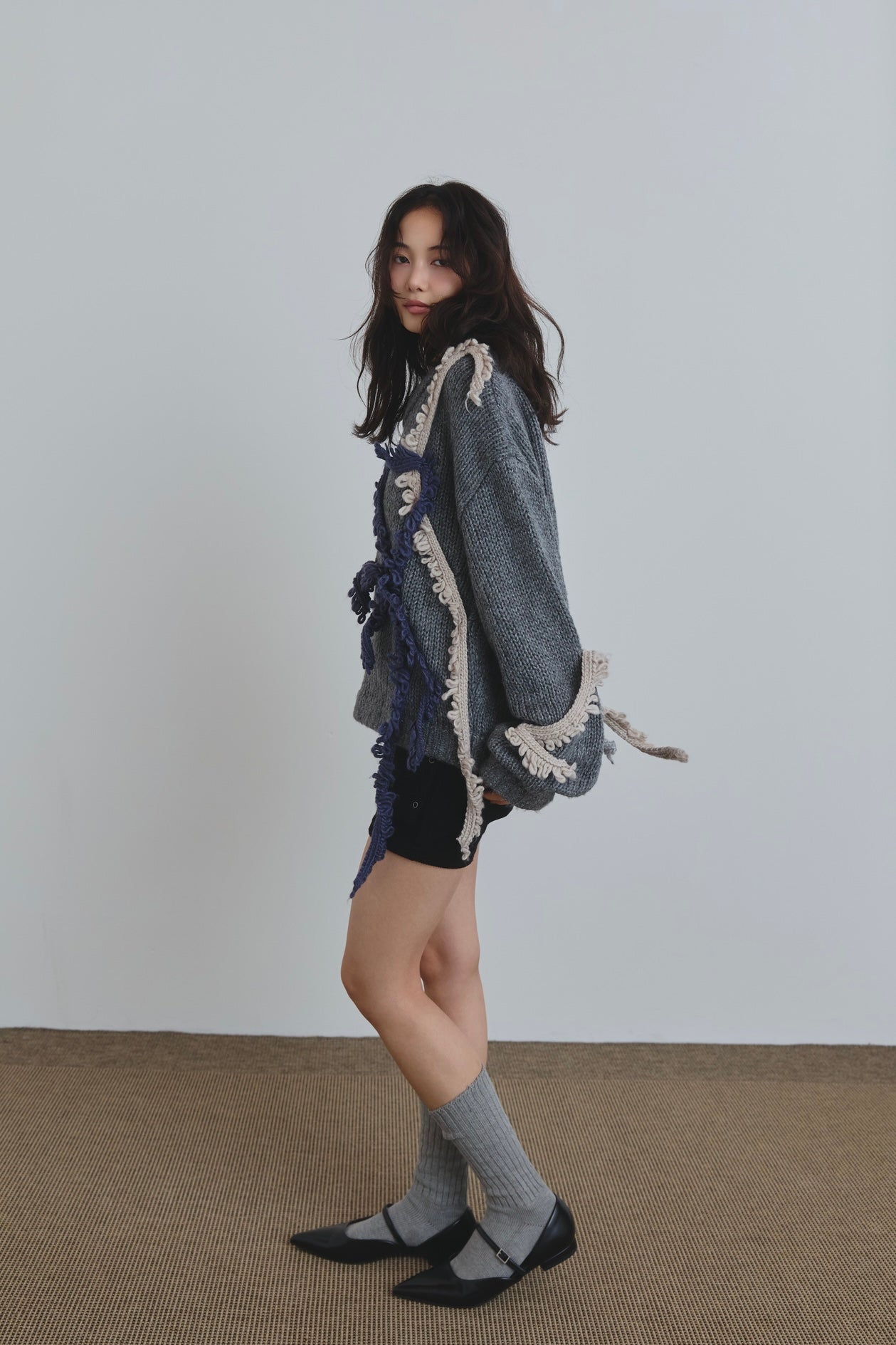 asymmetry fringe knit