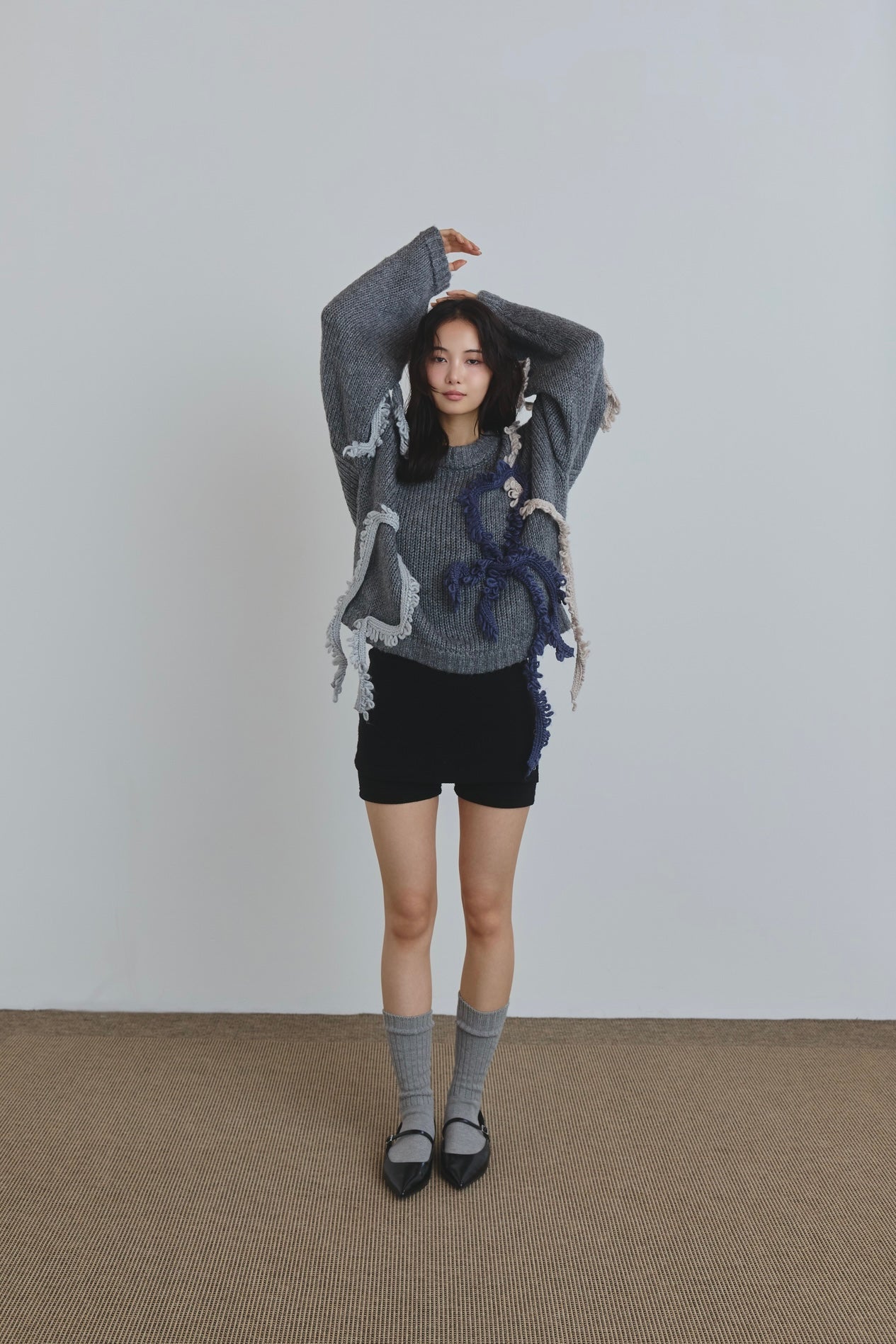 asymmetry fringe knit
