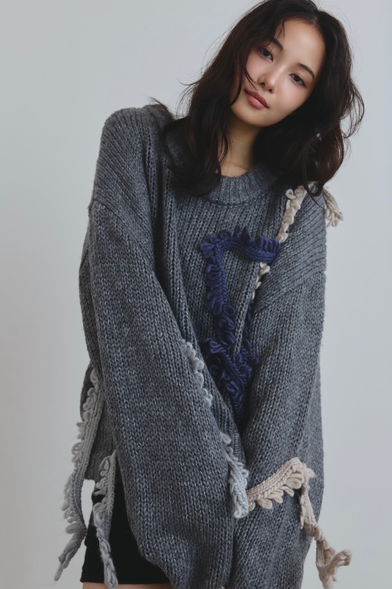 asymmetry fringe knit
