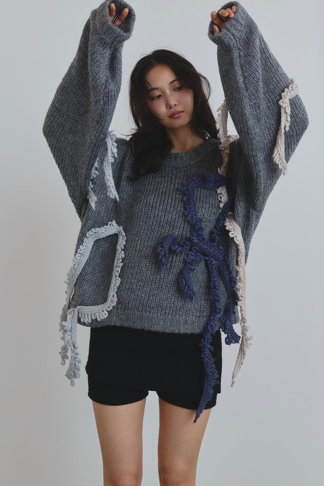 asymmetry fringe knit